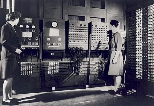 two woman operating ENIAC machine